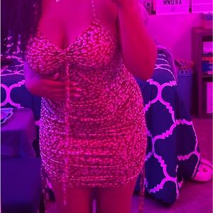 mini dress with an off-red floral pattern.